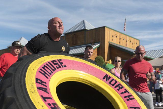 Greg Cochran Muscle Sgt. Greg Cochran flips 555-pound tire for breast cancer awareness ...