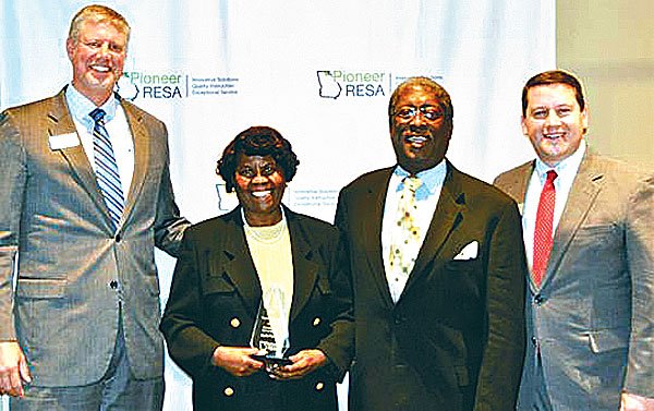 In Our Community Figueras Receives Pioneer In Education Award Gainesville Times