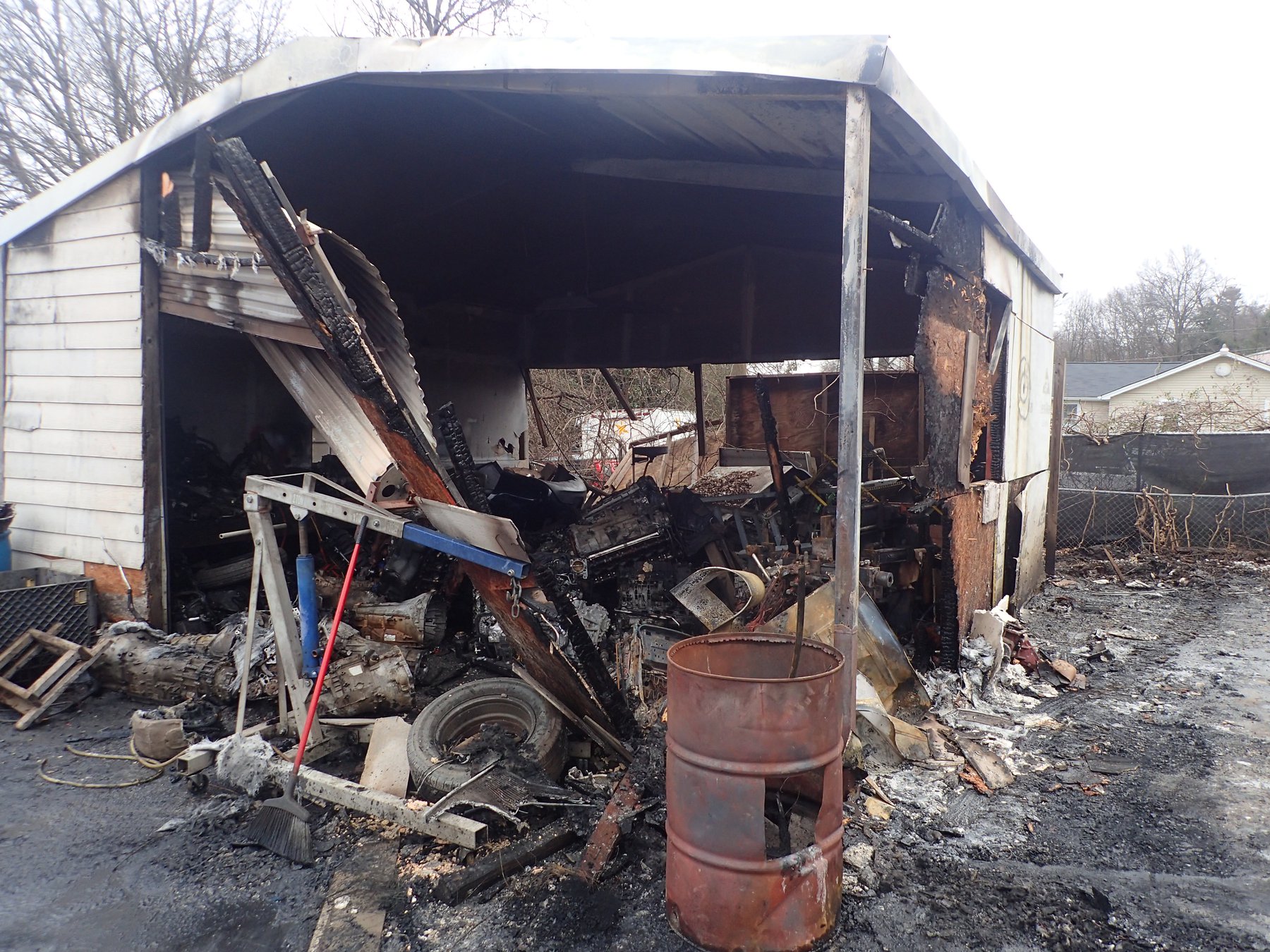 Fire spreads from burn barrel to cars, garage at Gainesville business