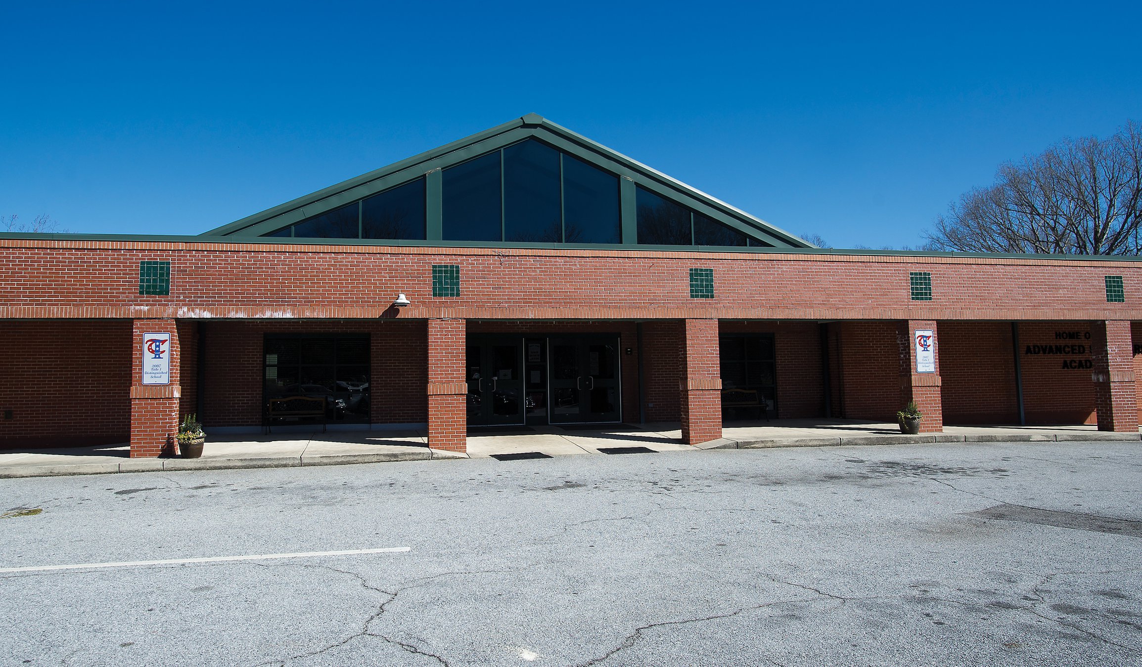 Why Hall wants to replace seven elementary schools with four