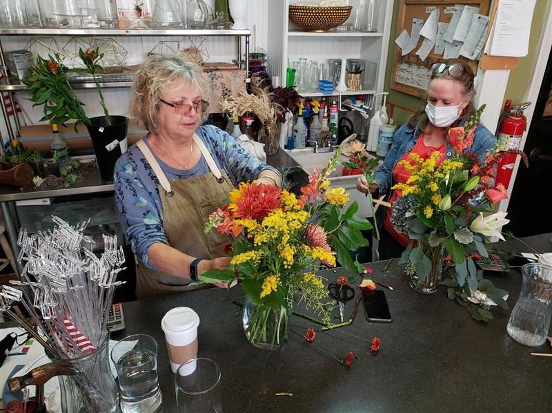 For Gainesville's awardwinning florists, arranging flowers is more