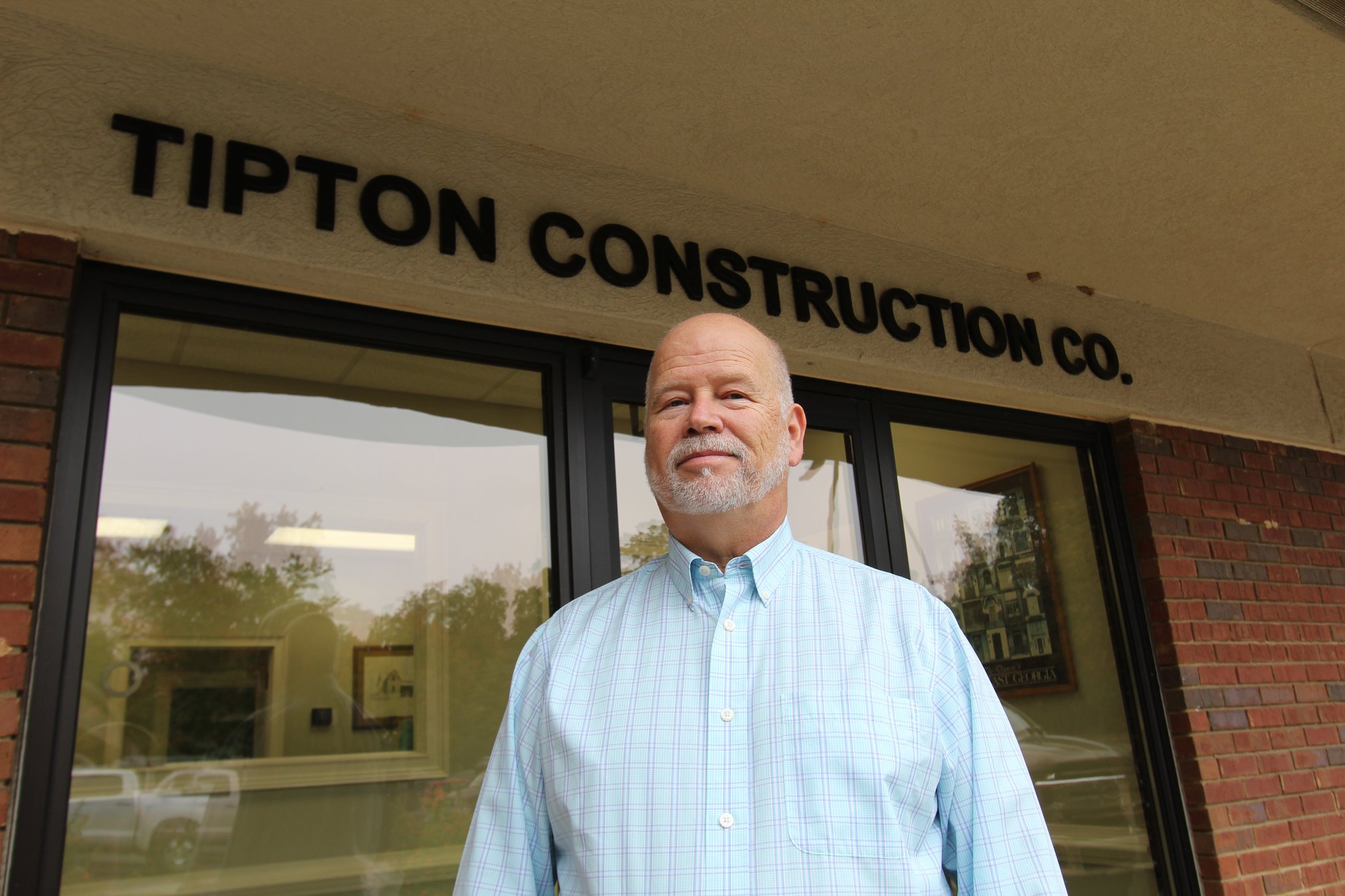 What made James Tipton turn from pursuing CPA degree to family construction business