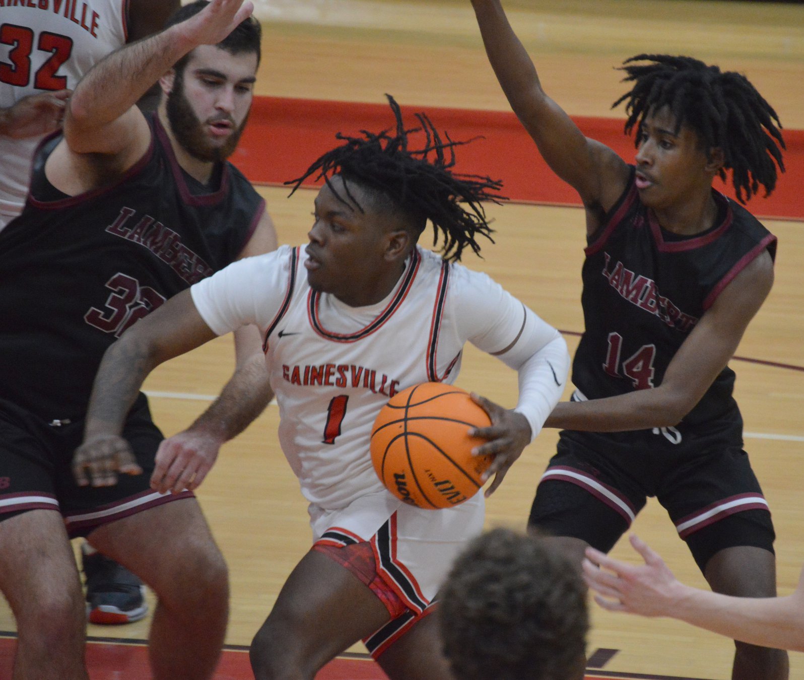 High school basketball Gainesville boys utilize late surge to take