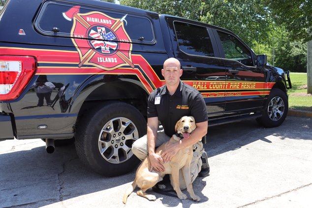 Apollo arson dog and Henderson HCFR vehicle.jpg