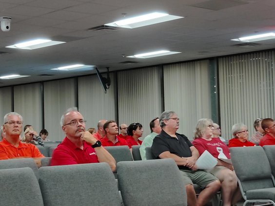 JM Turk - people in red opposed.jpg