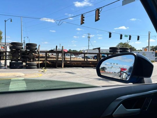 Braselton police investigating crash between log truck, motorcyclist