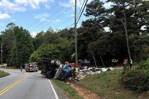 05142026 trash truck overturned