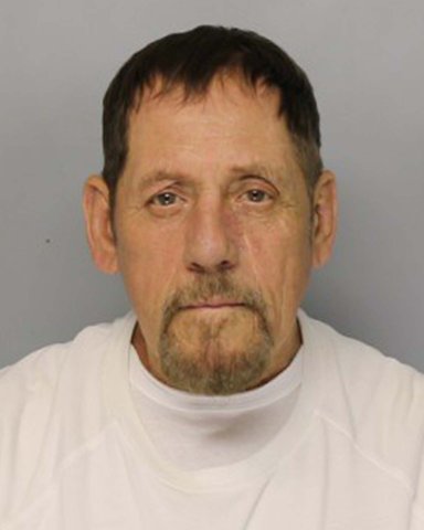 Gainesville man accused of chasing 13-year-old, father with shears during house fire
