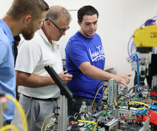 Lanier Tech Student Demonstrating The AI Robotic Trainer.jpg
